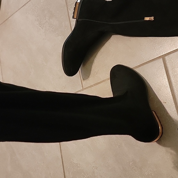 Knee-length boots with gold heel accent, side zipper, and adjustable back laces. - Picture 5 of 14